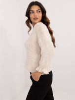 Jasnobeżowy sweter oversize z okrągłym dekoltem